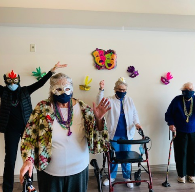 a group of people wearing masks