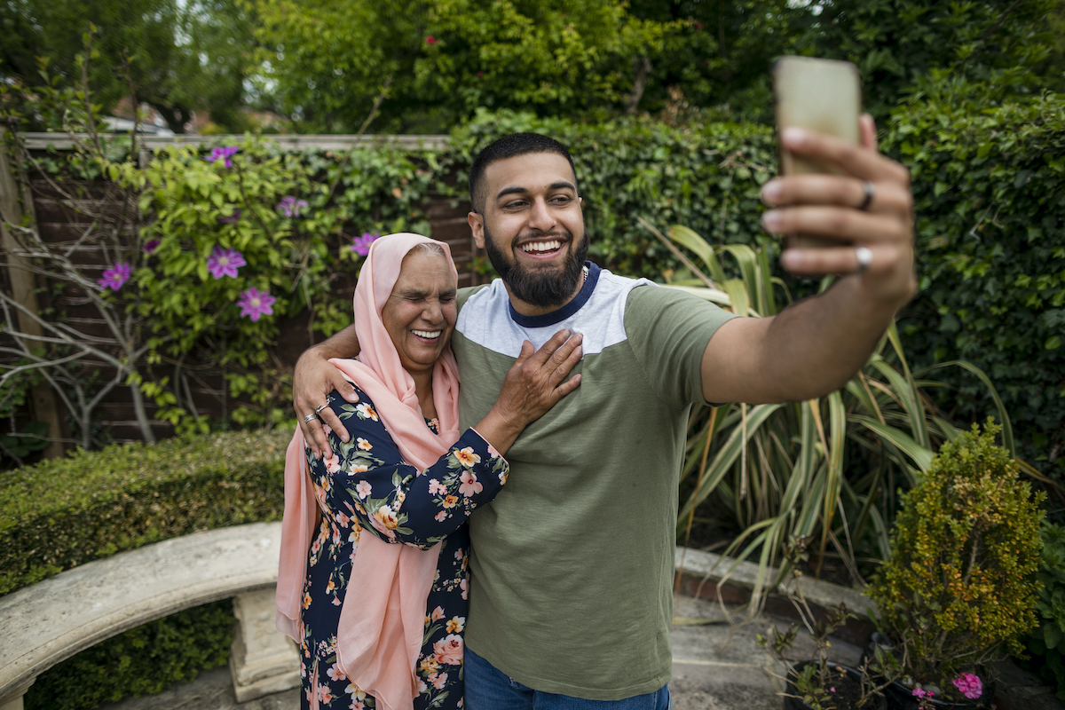 a person and person taking a selfie