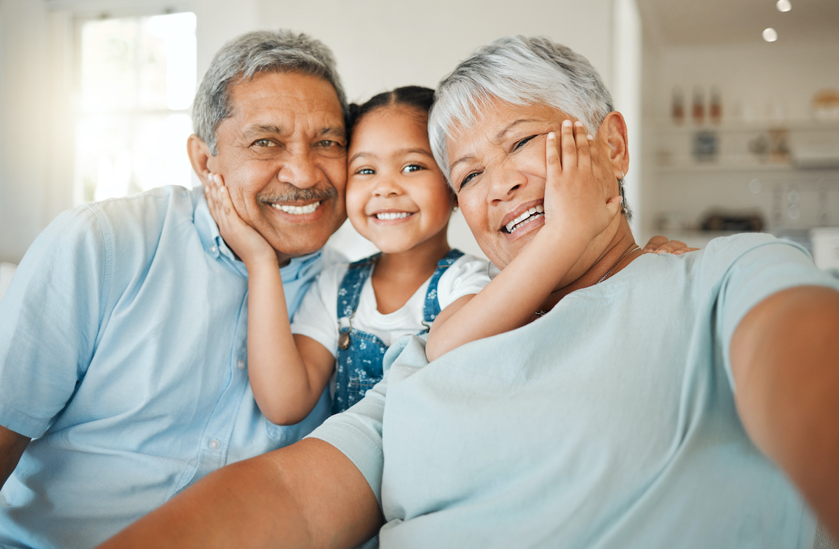a smiling family with a child