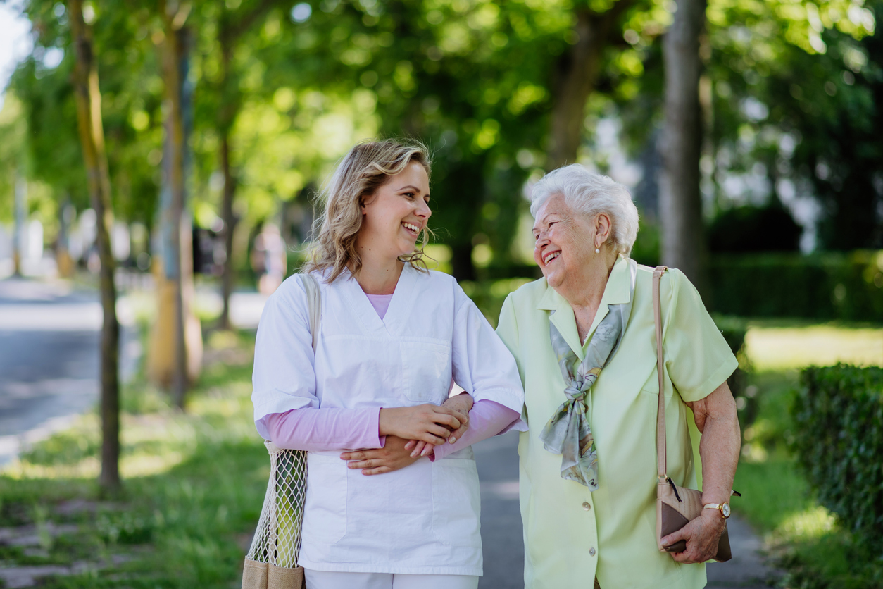 a person and a person walking in a park