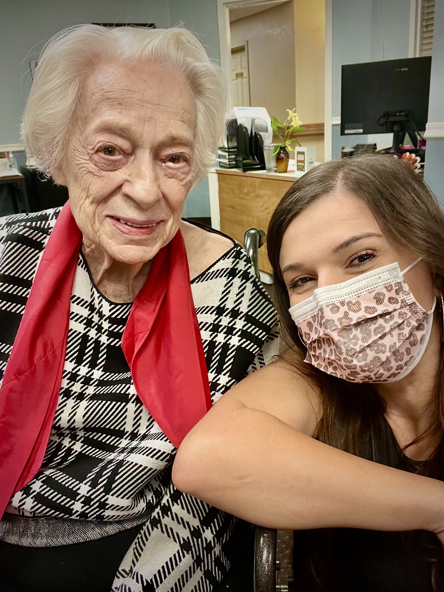 a person and a young person wearing a mask