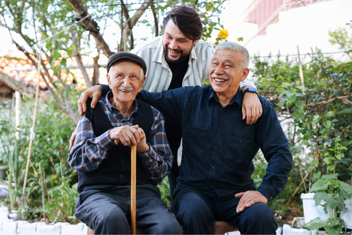 Caregiver with senior and family member