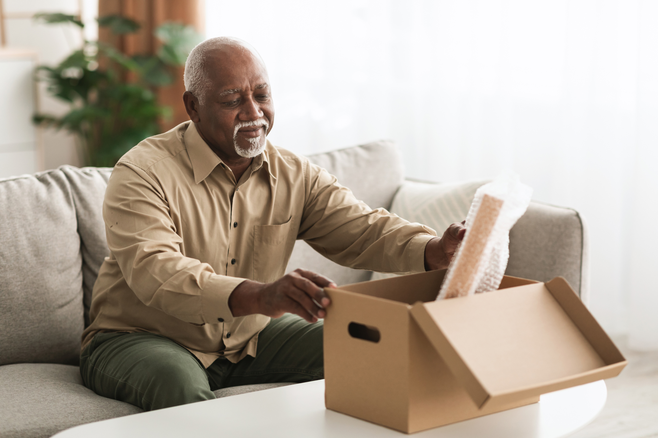 a person opening a box