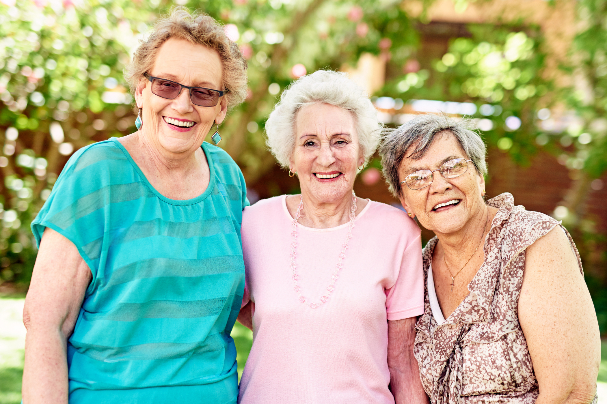 a group of older women smiling